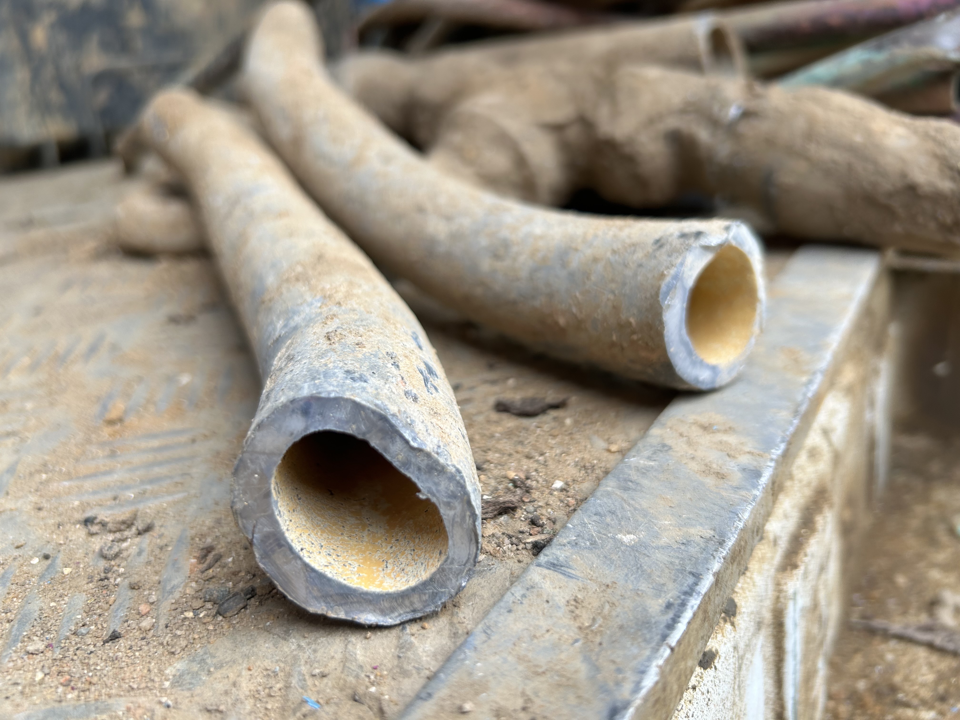 lead pipes on ground