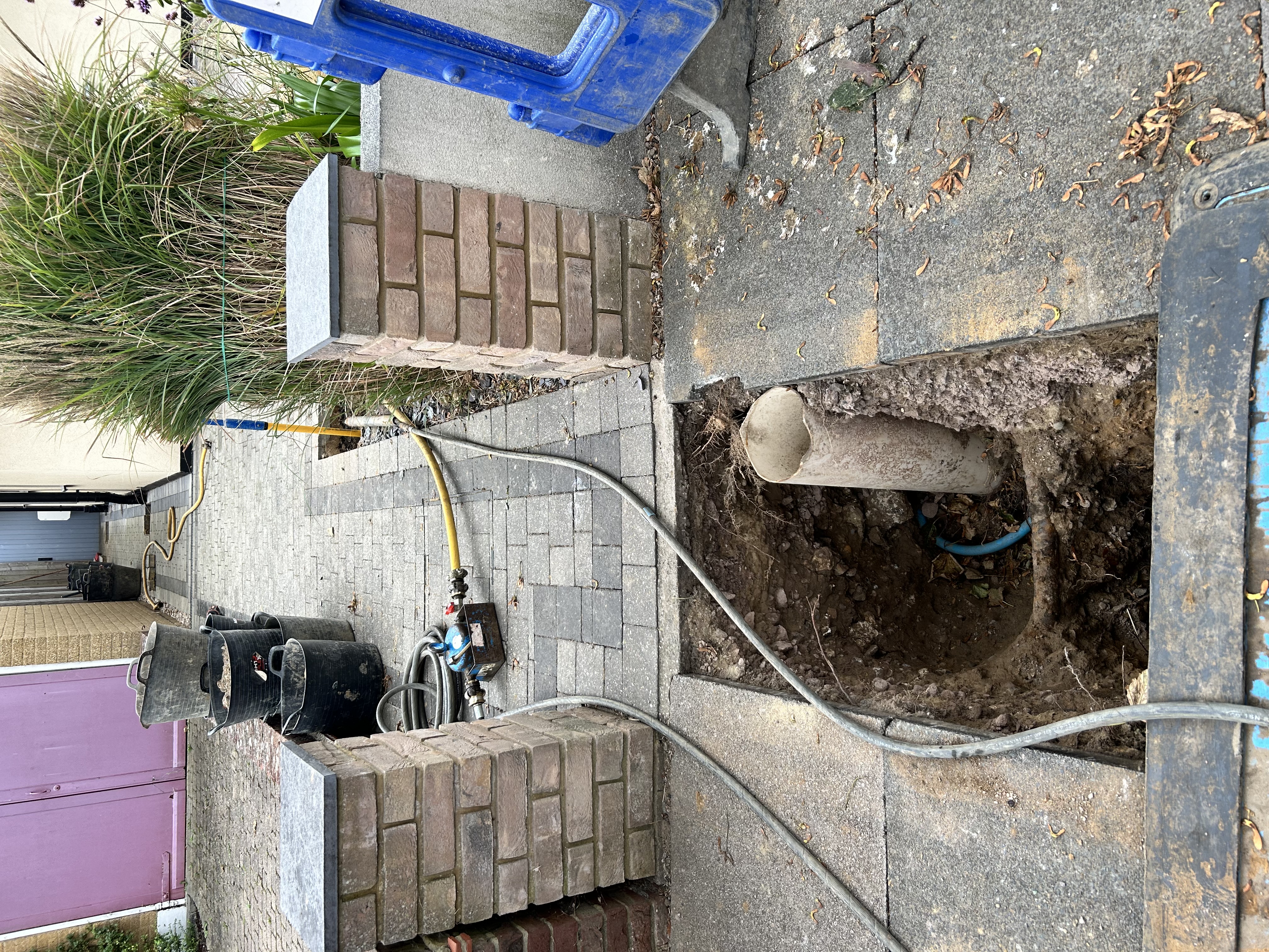 hole in ground showing trenchless technology