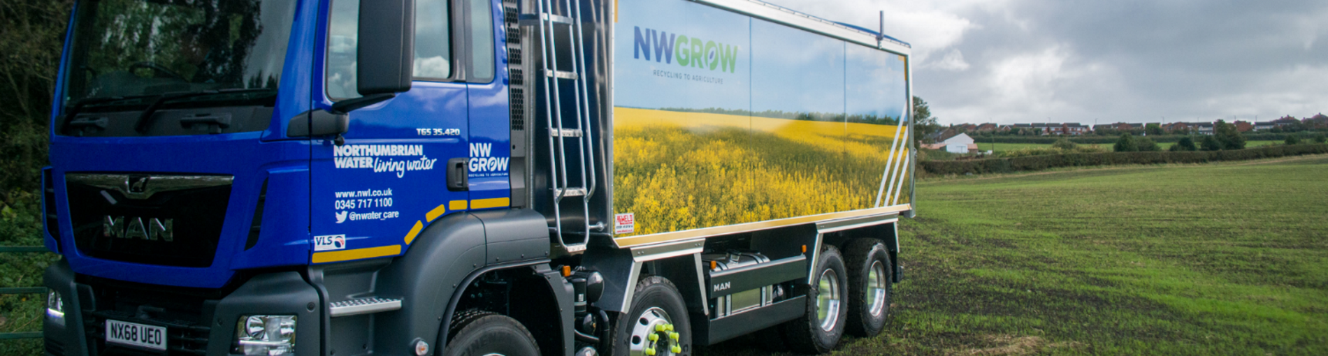 Northumbrian Water lorry with NWGROW logo in field